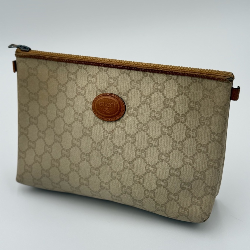 Gucci Plus Tan Monogram pouch